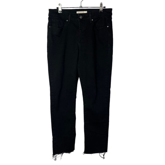 Levi's Classic Mid Rise Skinny Raw Hem Black Jeans 12 - Picture 1 of 4